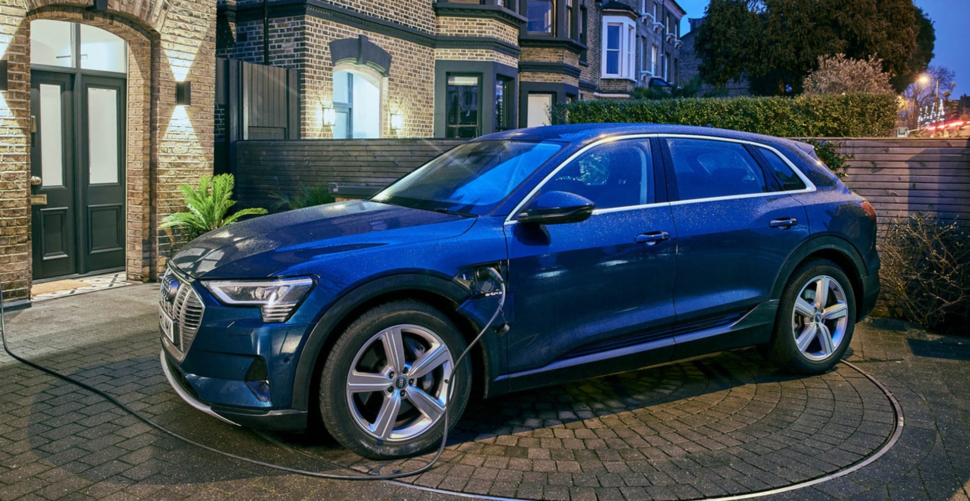 electric car charging in driveway